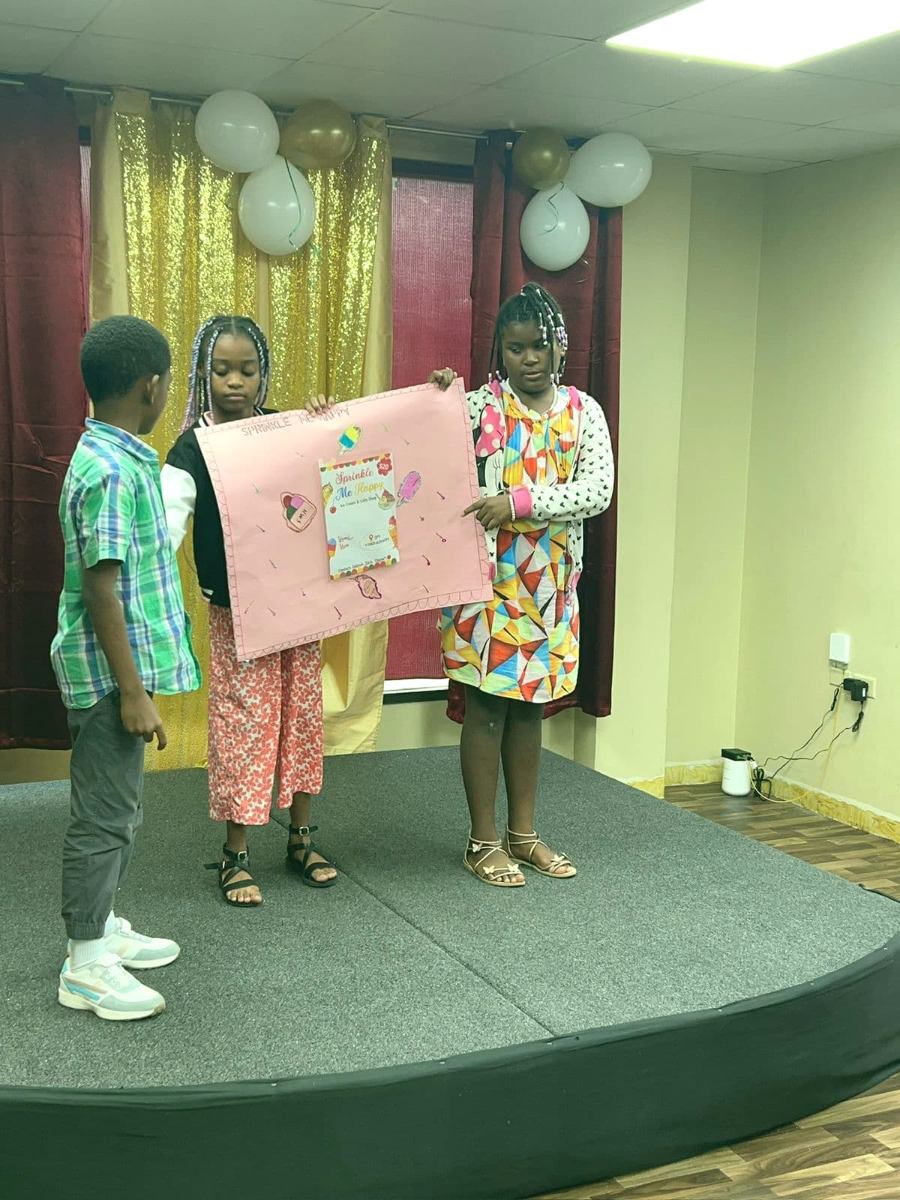 Presenting the Sprinkle Me Happy business idea on stage